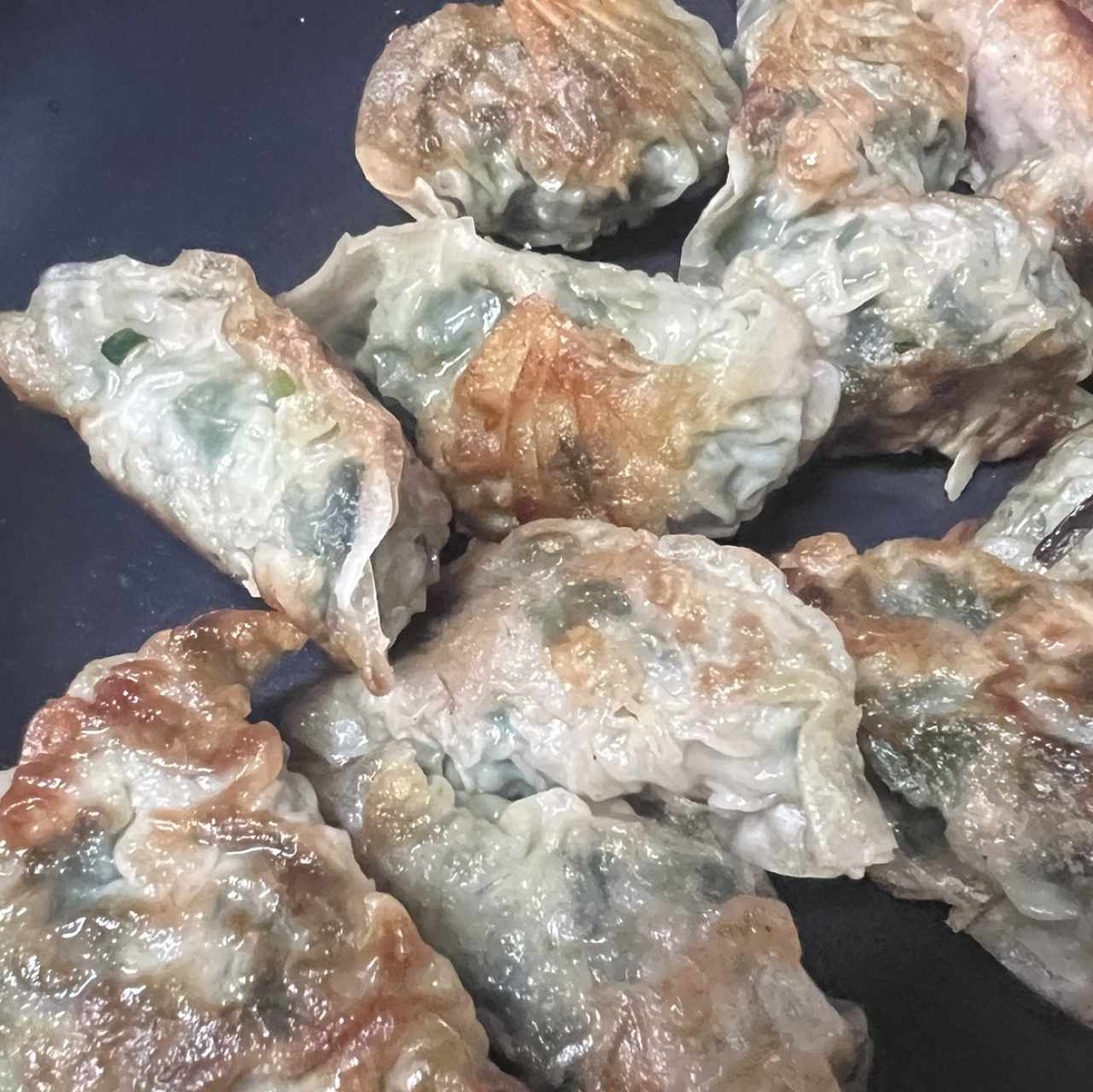 Dumpling de puerco con cebollina