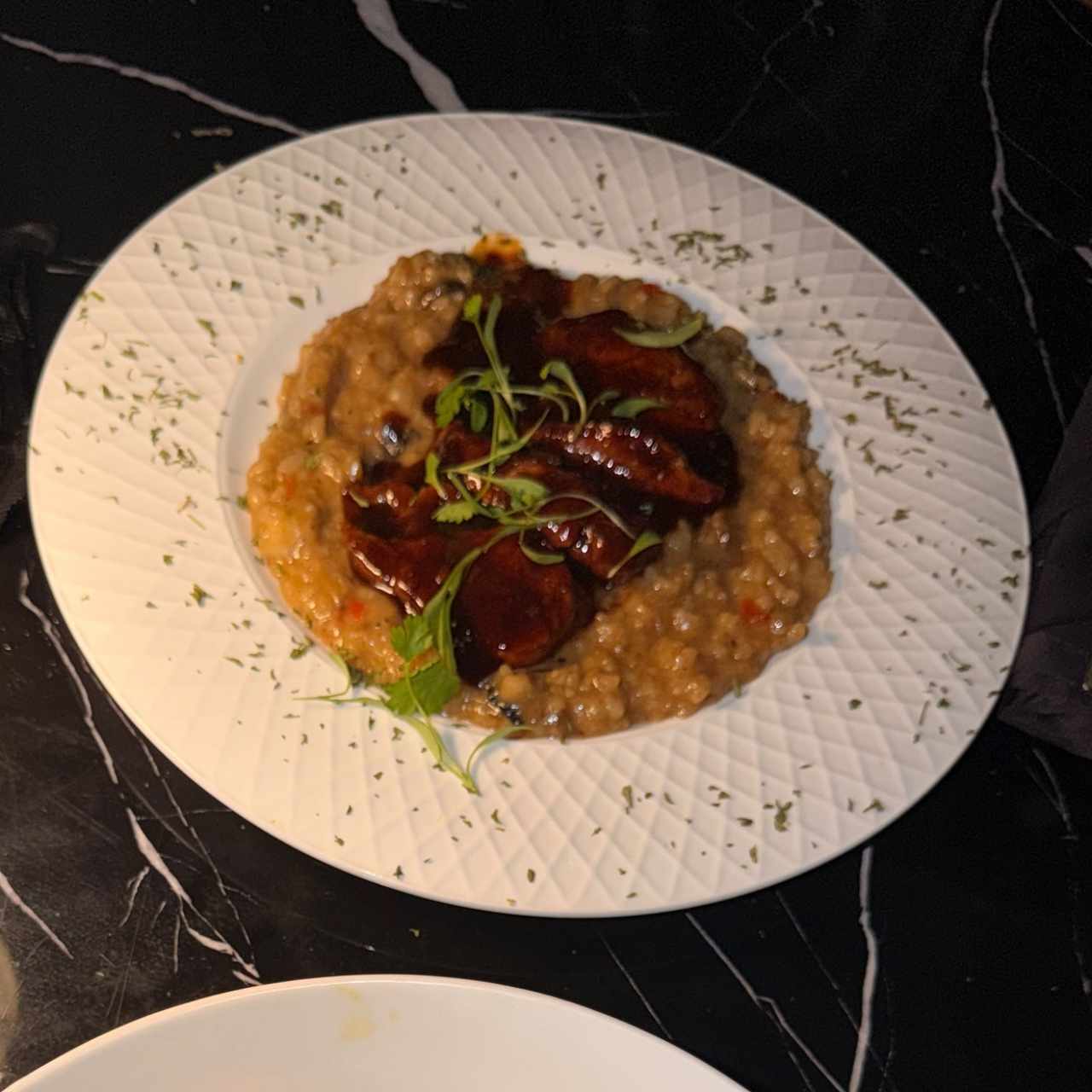 Arroz meloso con hongos y filete 