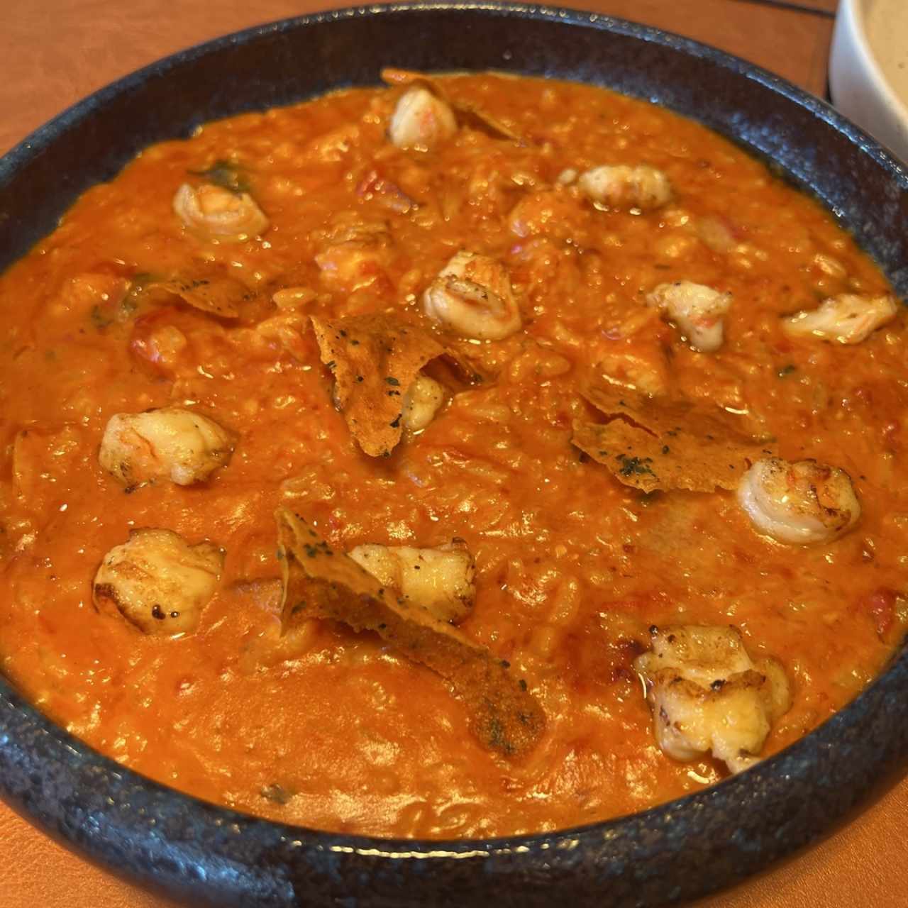 Risotto con pomodorini affumicati e gamberi