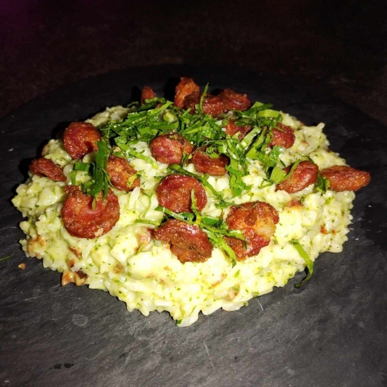 Rissotto de culantro con chorizo tableño y ralladura de queso blanco