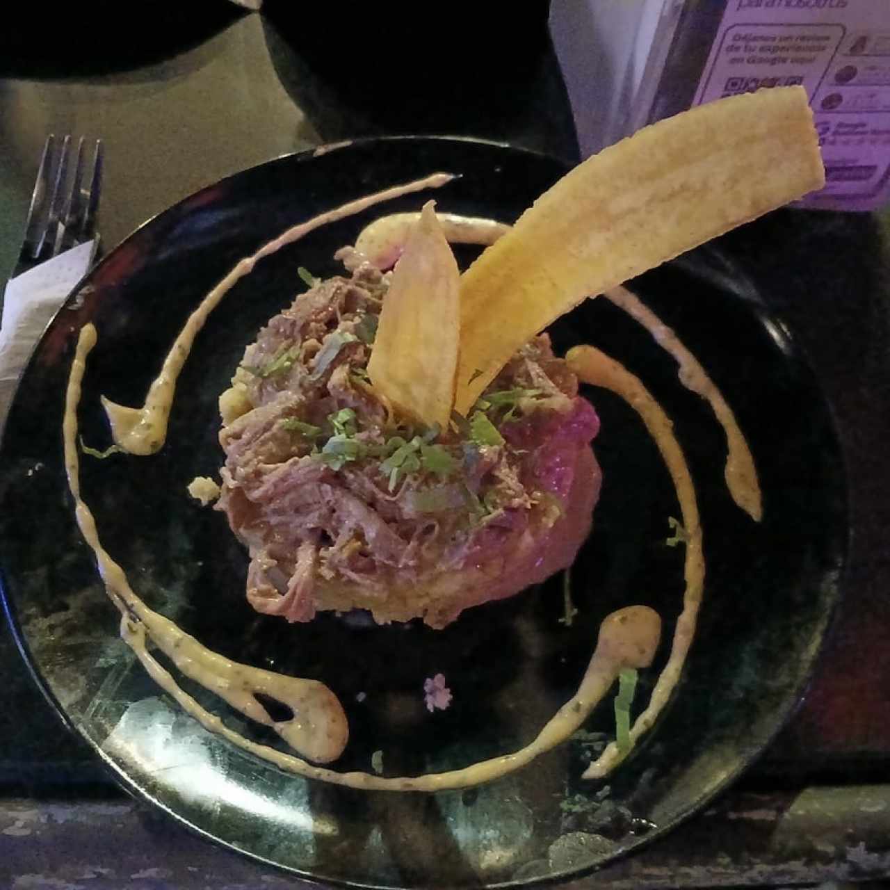 Ropa Vieja En salsa de Curry Con coco y puré de plátano verde