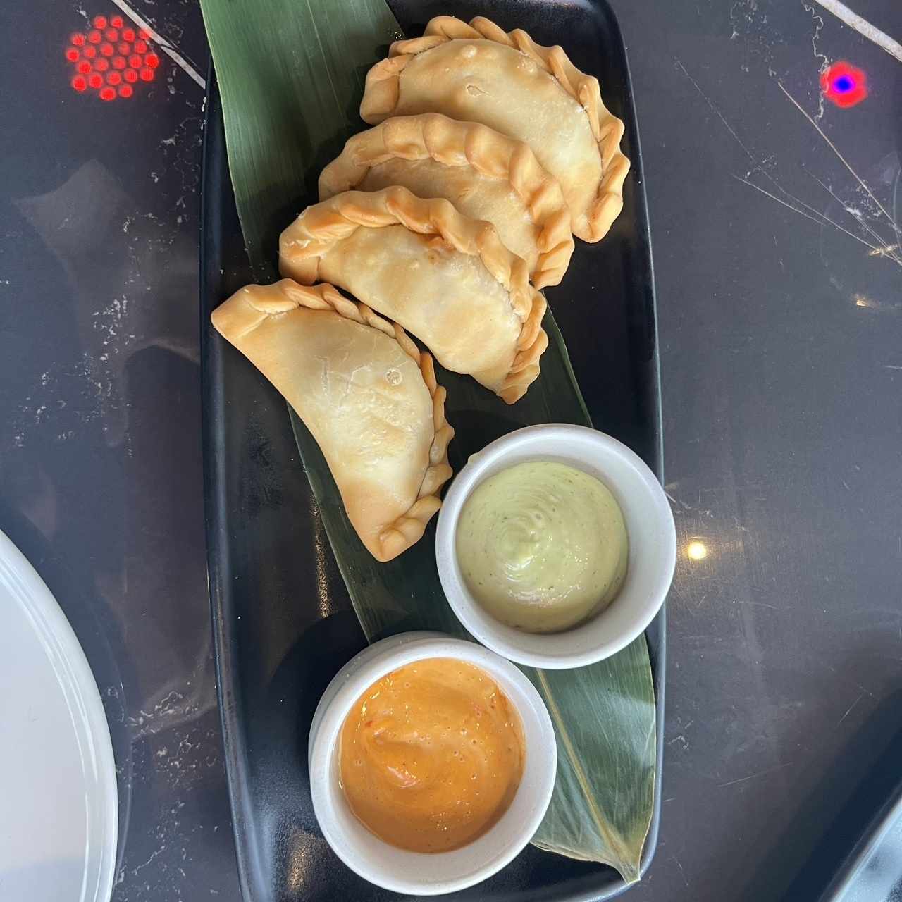 EMPANADAS DE PULPO AL COCO