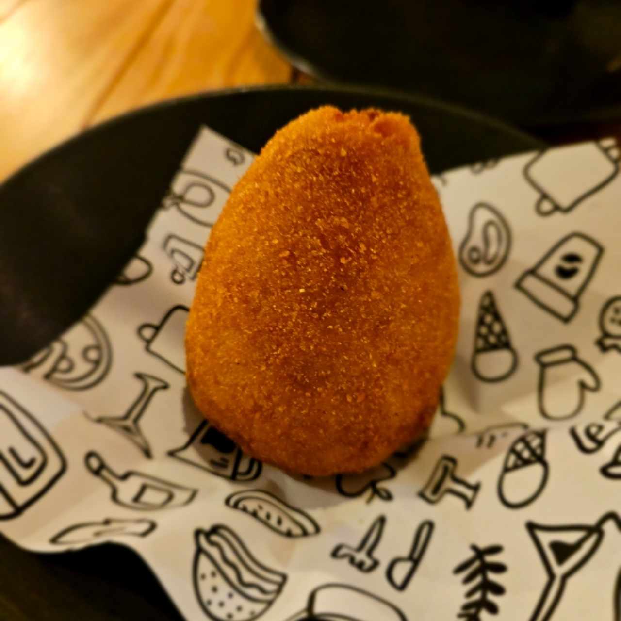 Arancino (Croquetas de arroz frito rellena)