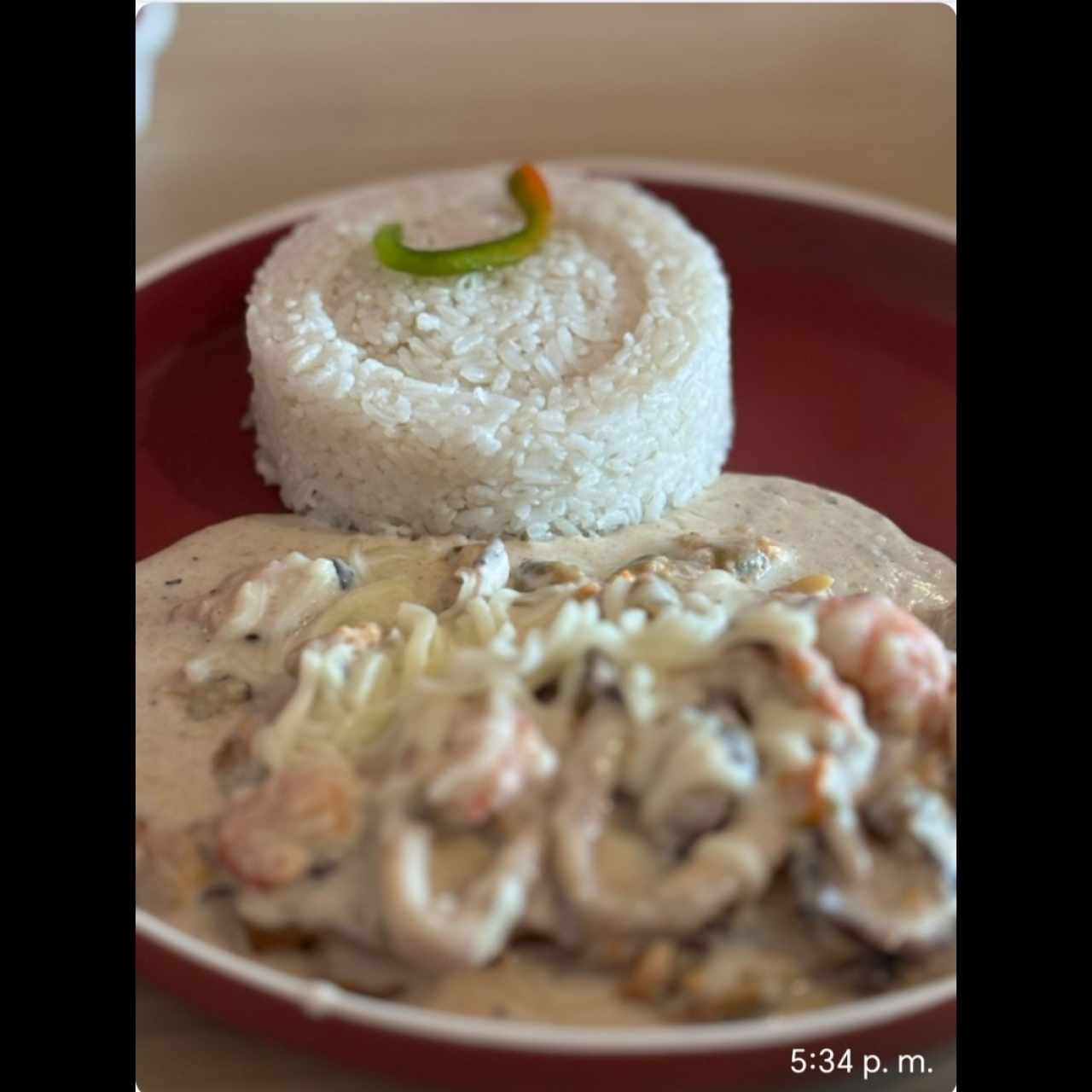 Corvina en salsa blanca Con Mariscos