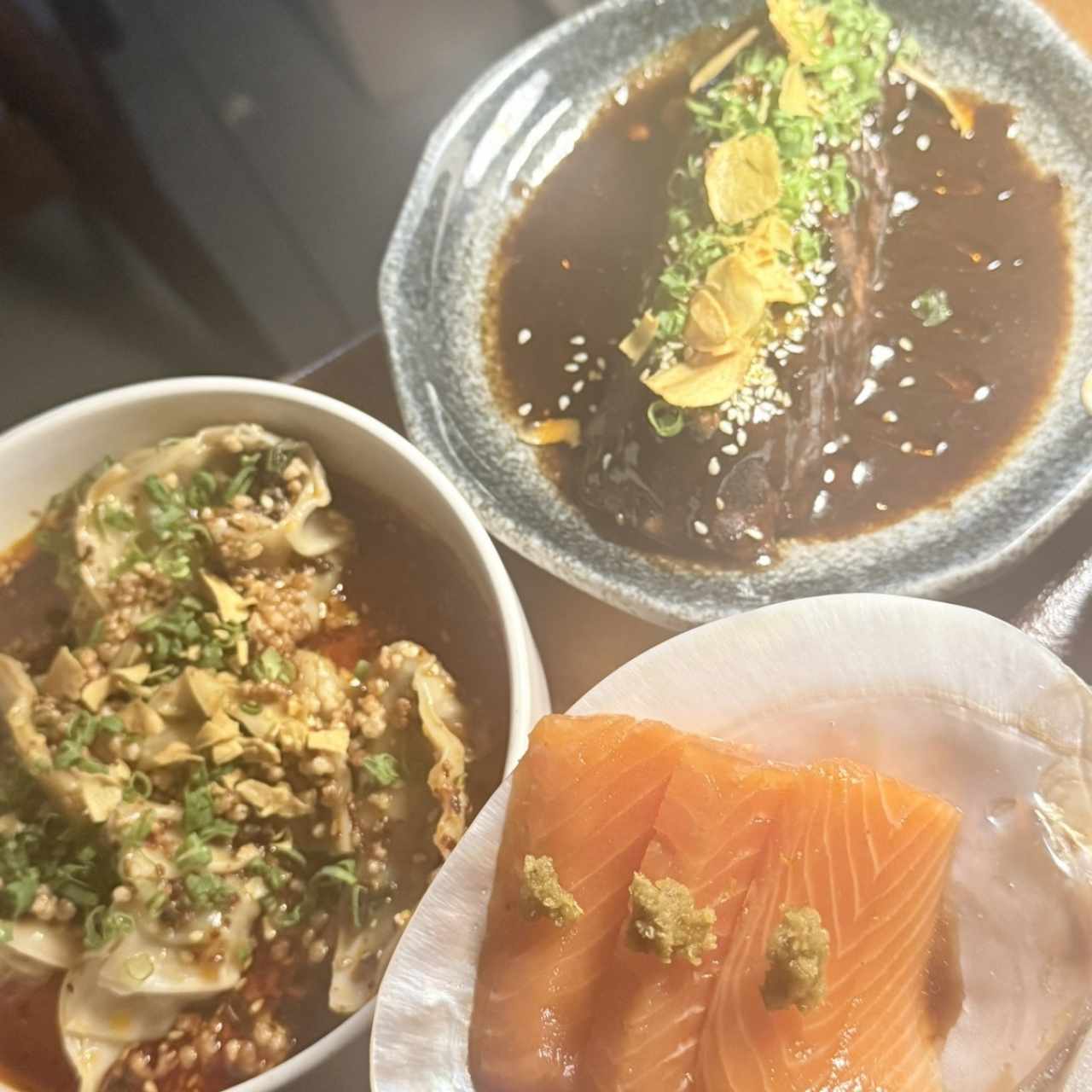 Pork, sashimi and dumplings