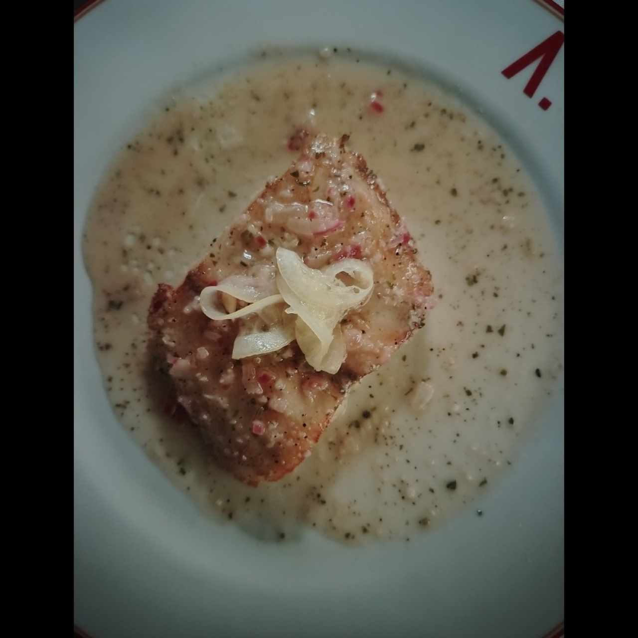 Pesca del día con risotto