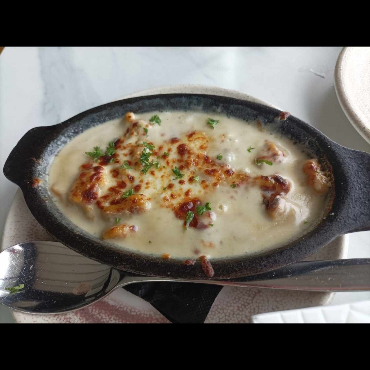 Ñoquis de camote gratinado