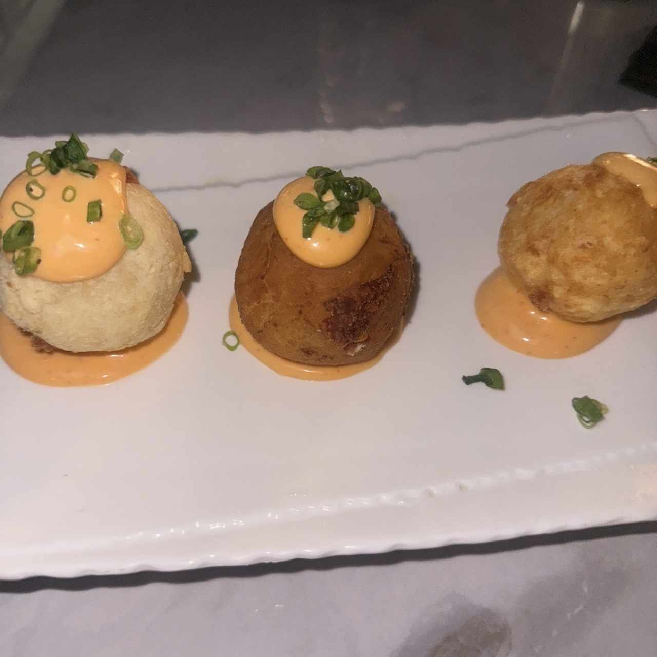 Carimañolas de provolone