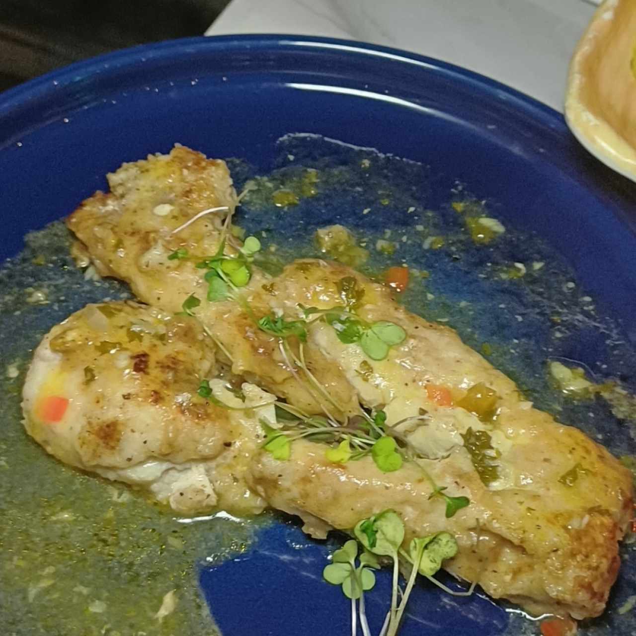 Filete de Corvina al Ajillo