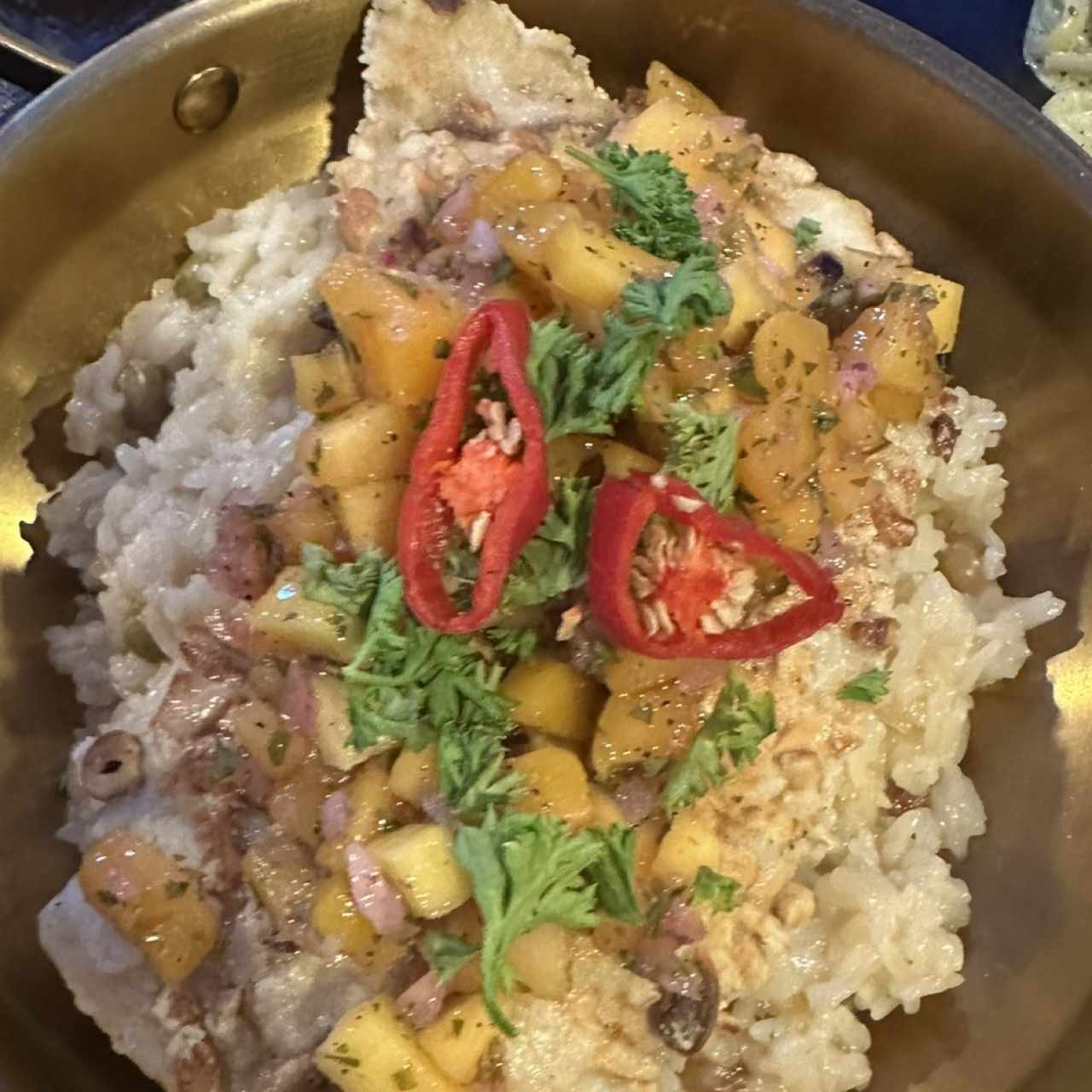 Pesca del día con arroz cremoso