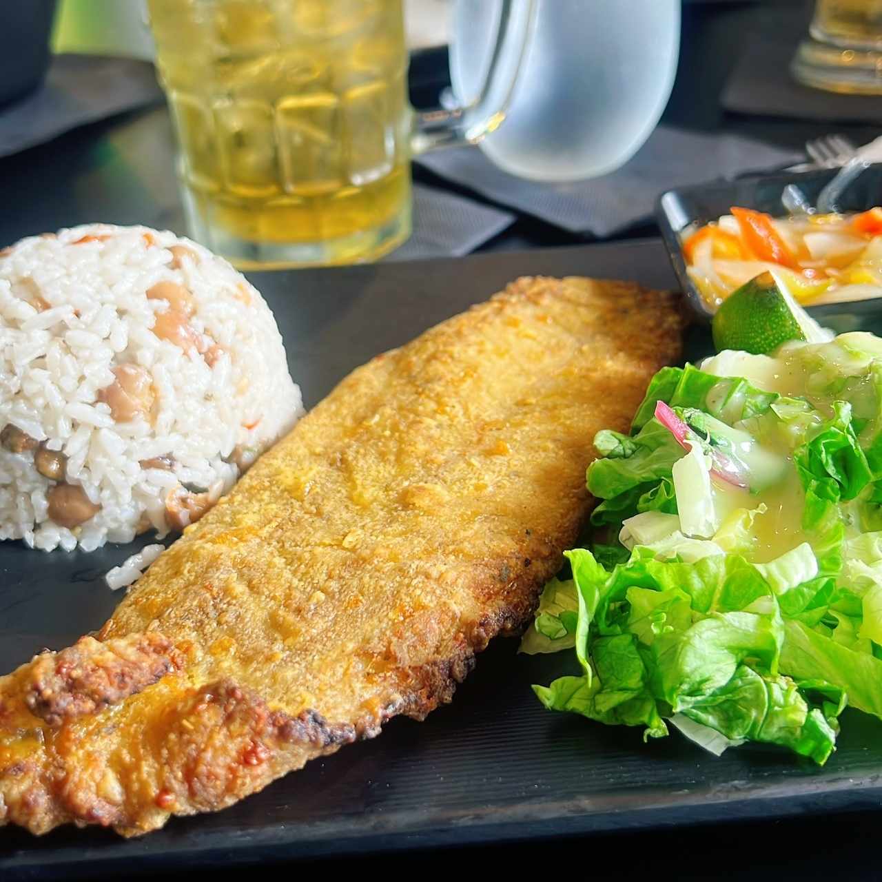 Filete de pescado , con arroz de coco