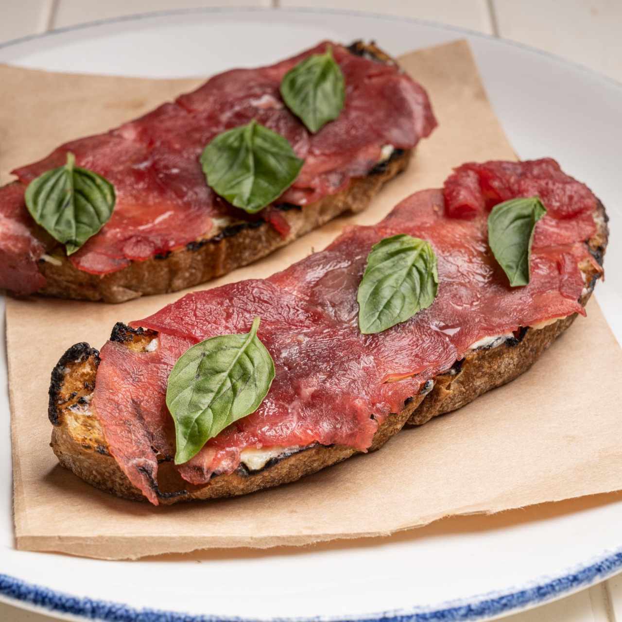 CROSTINI DI CARPACCIO AL TARTUFO