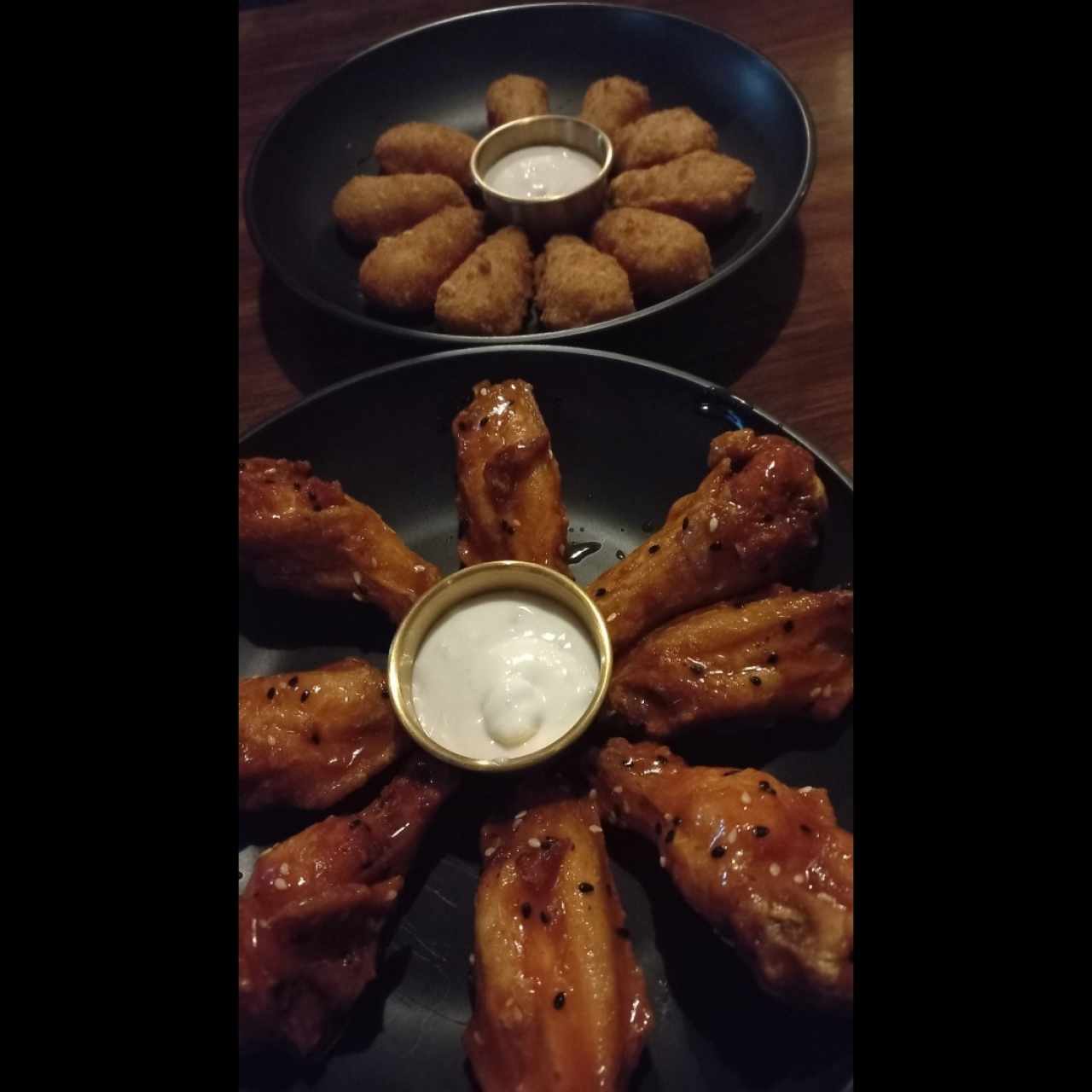 jalapeño poppers/ buffalo wings
