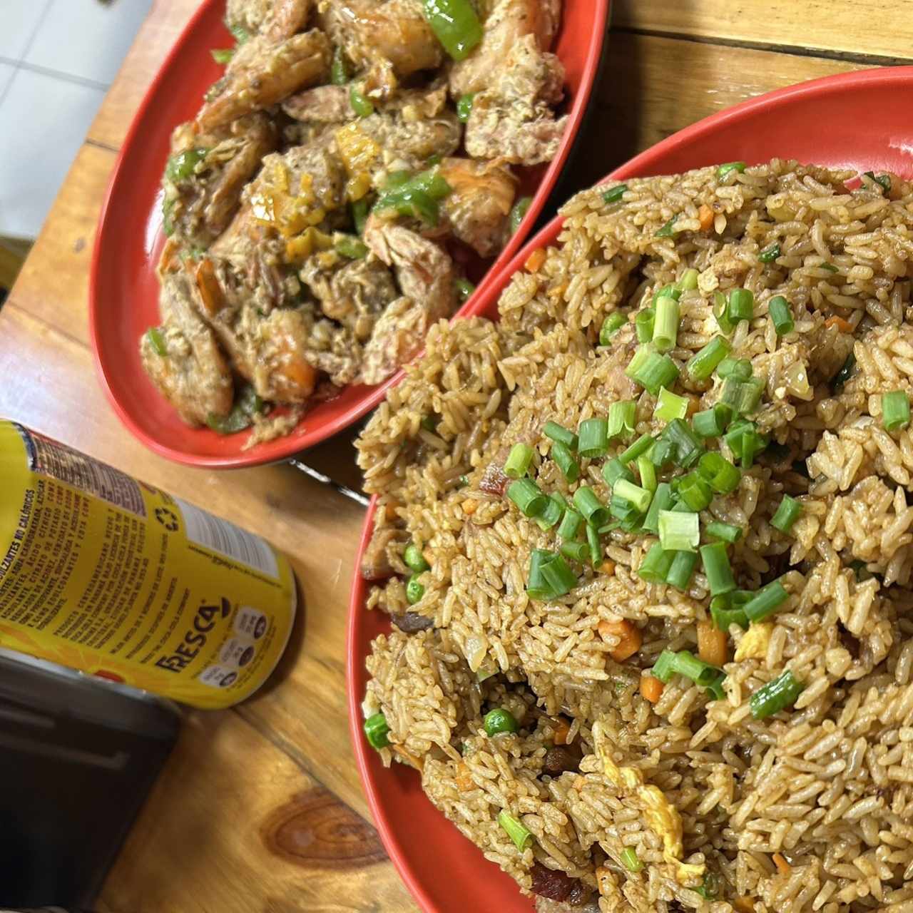 Langostinos con sal y pimienta con arroz frito de puerco