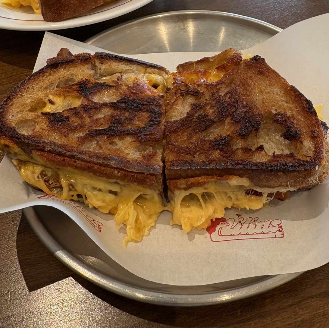 Derretido de queso, huevo y bacon