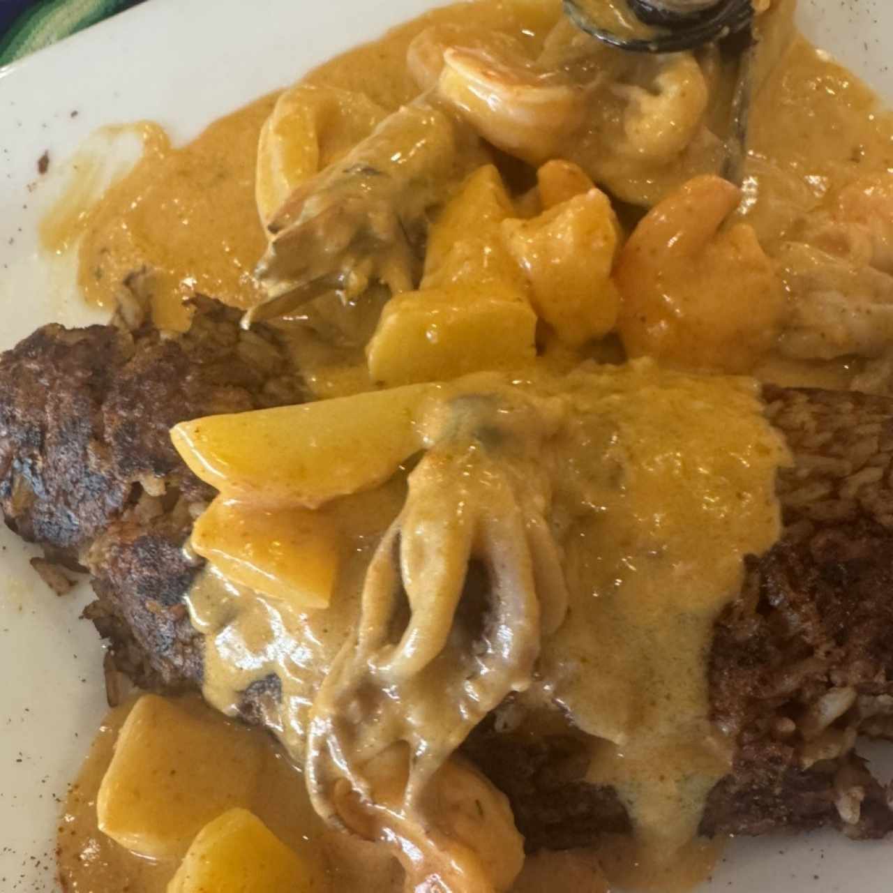 Tacu Tacu de picante de mariscos