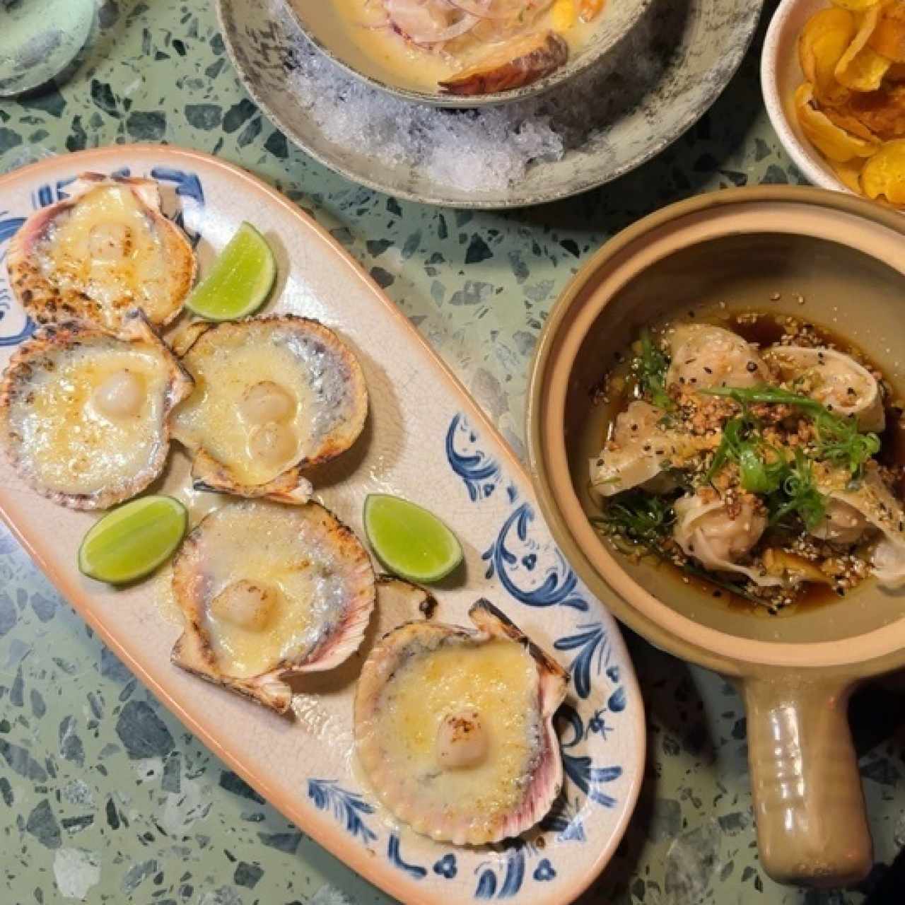 Conchas a la parmesana y Pork Dumplings