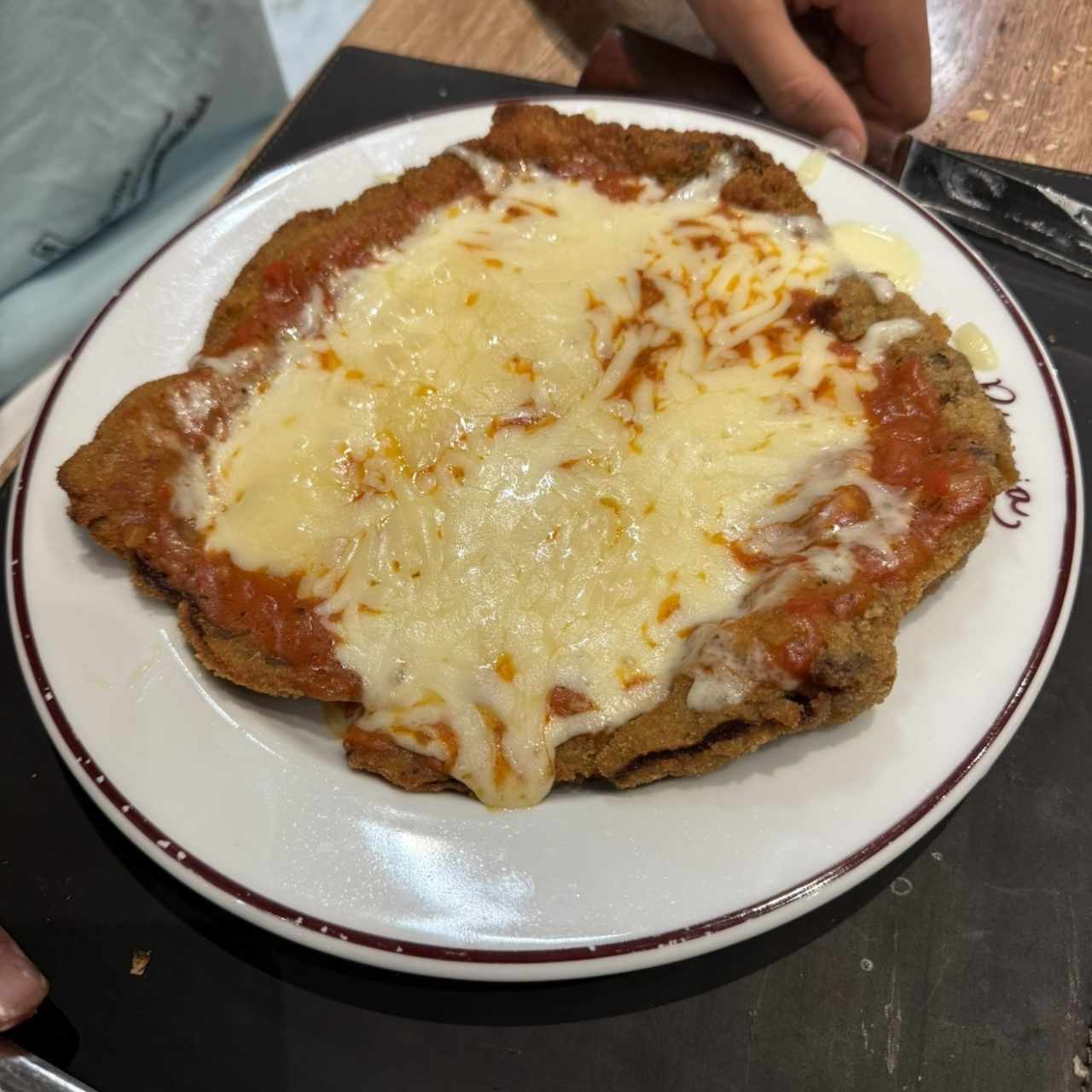Milanesa de Pollo con queso Parmesano