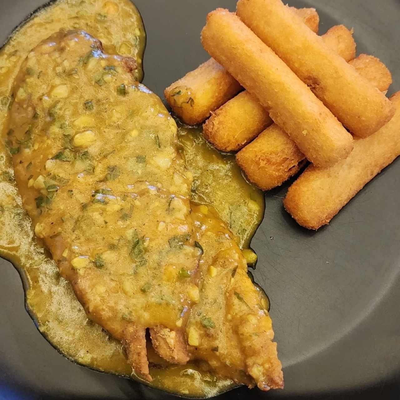 filete de corvina al ajillo 