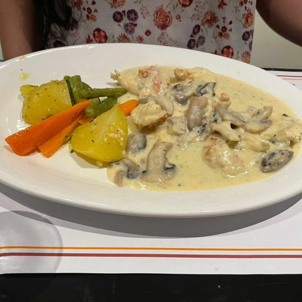 Cola de Langosta en Salsa de Champiñones