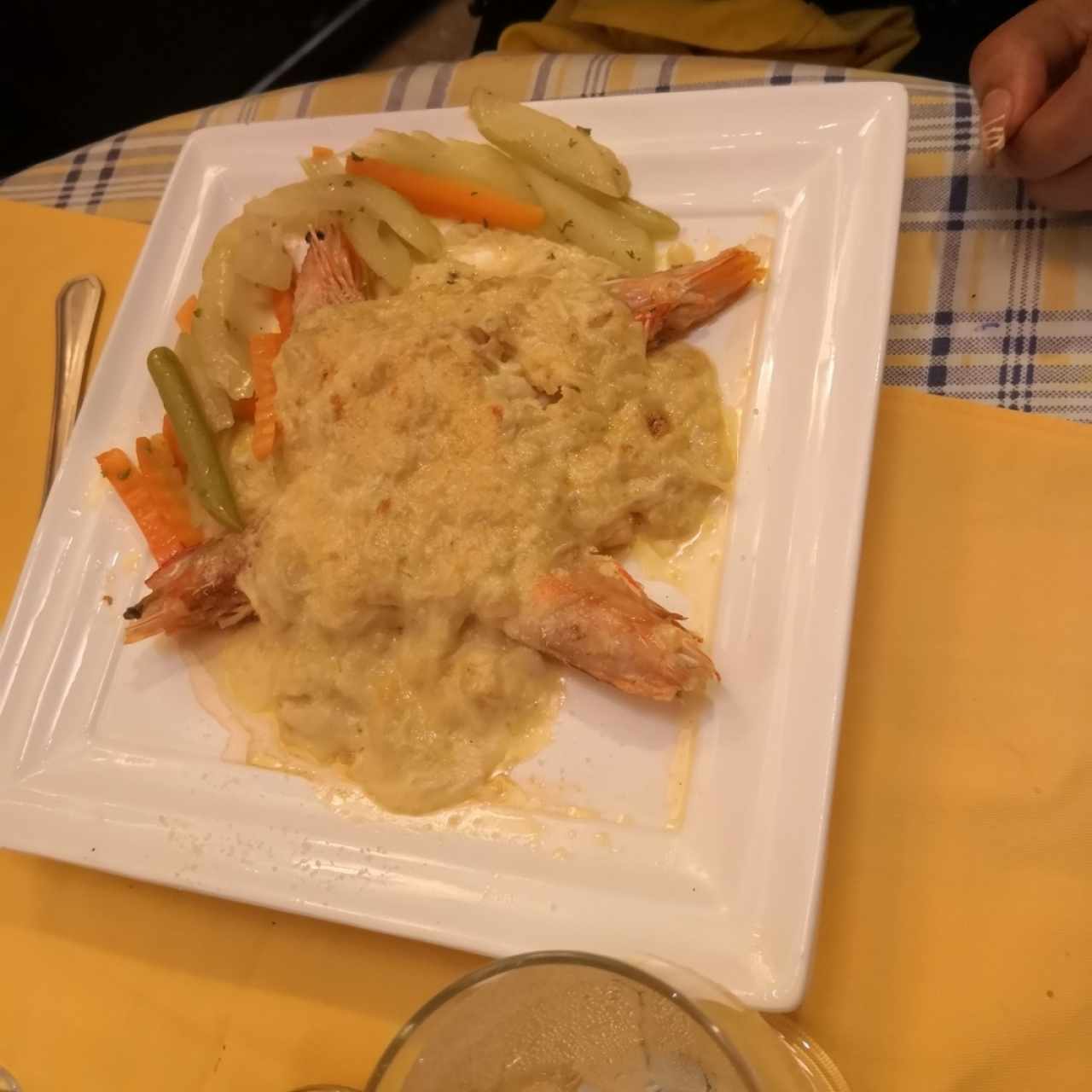 langostino con centollo gratinado