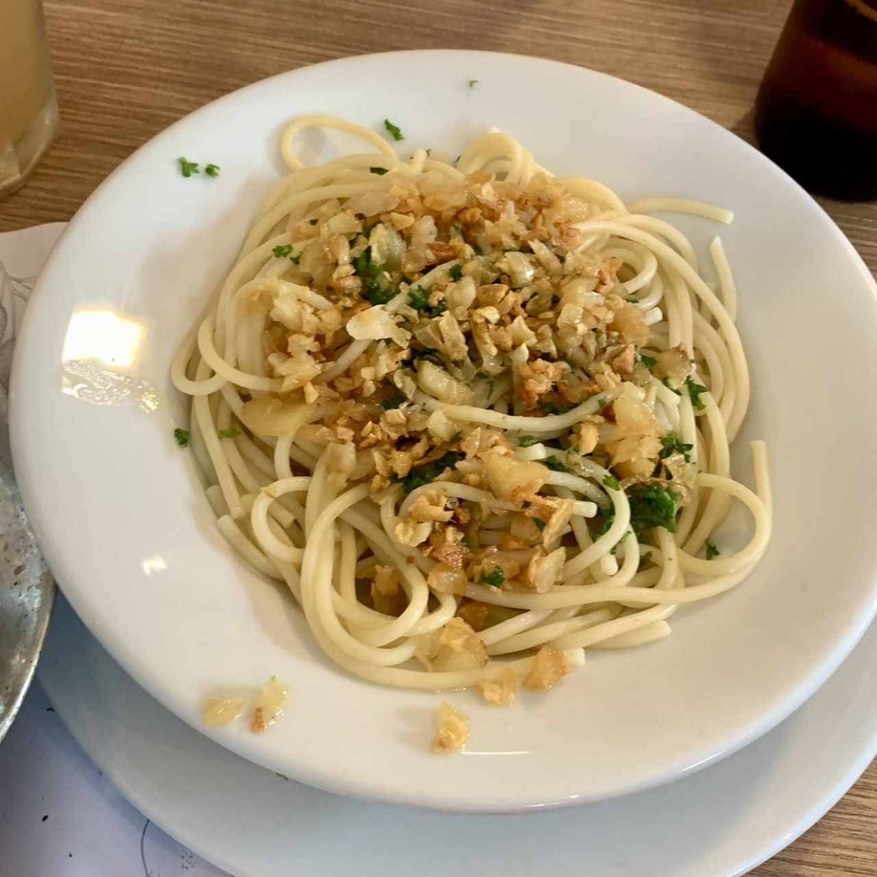 Acompañante de la corvina Espagueti al aglio e olio
