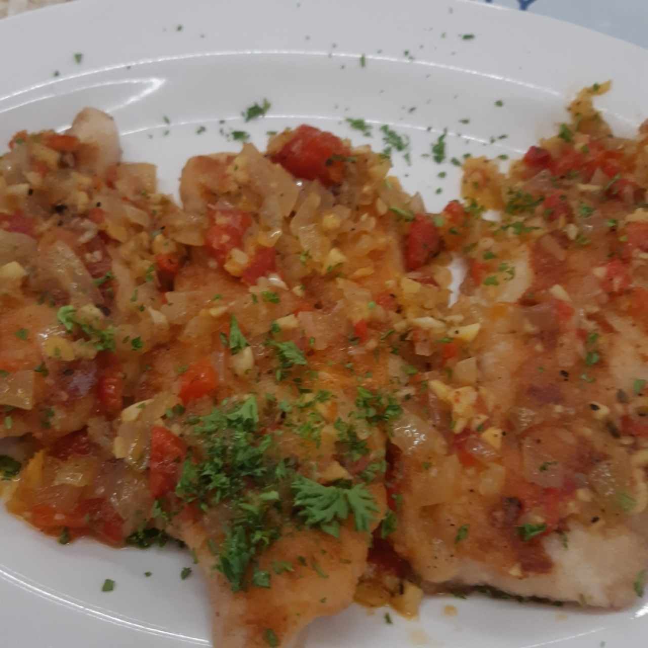 Filete de Corvina a la plancha o a la Griega, al Ajillo, o la criolla