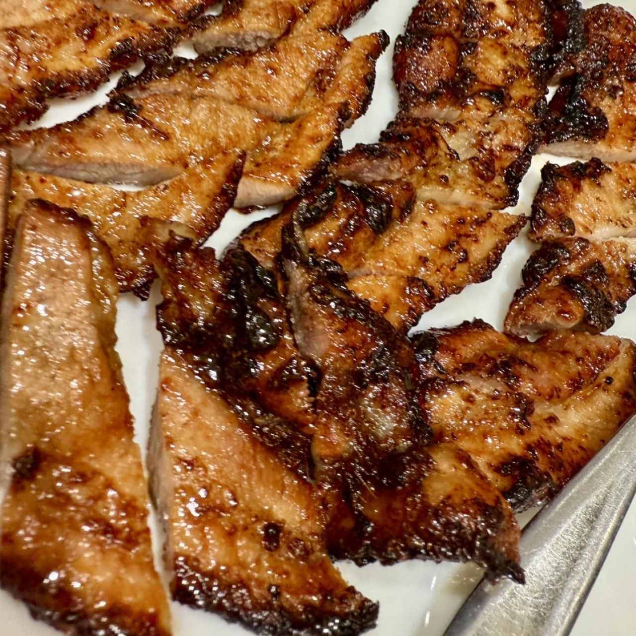 Platos especiales - Puerco al carbón