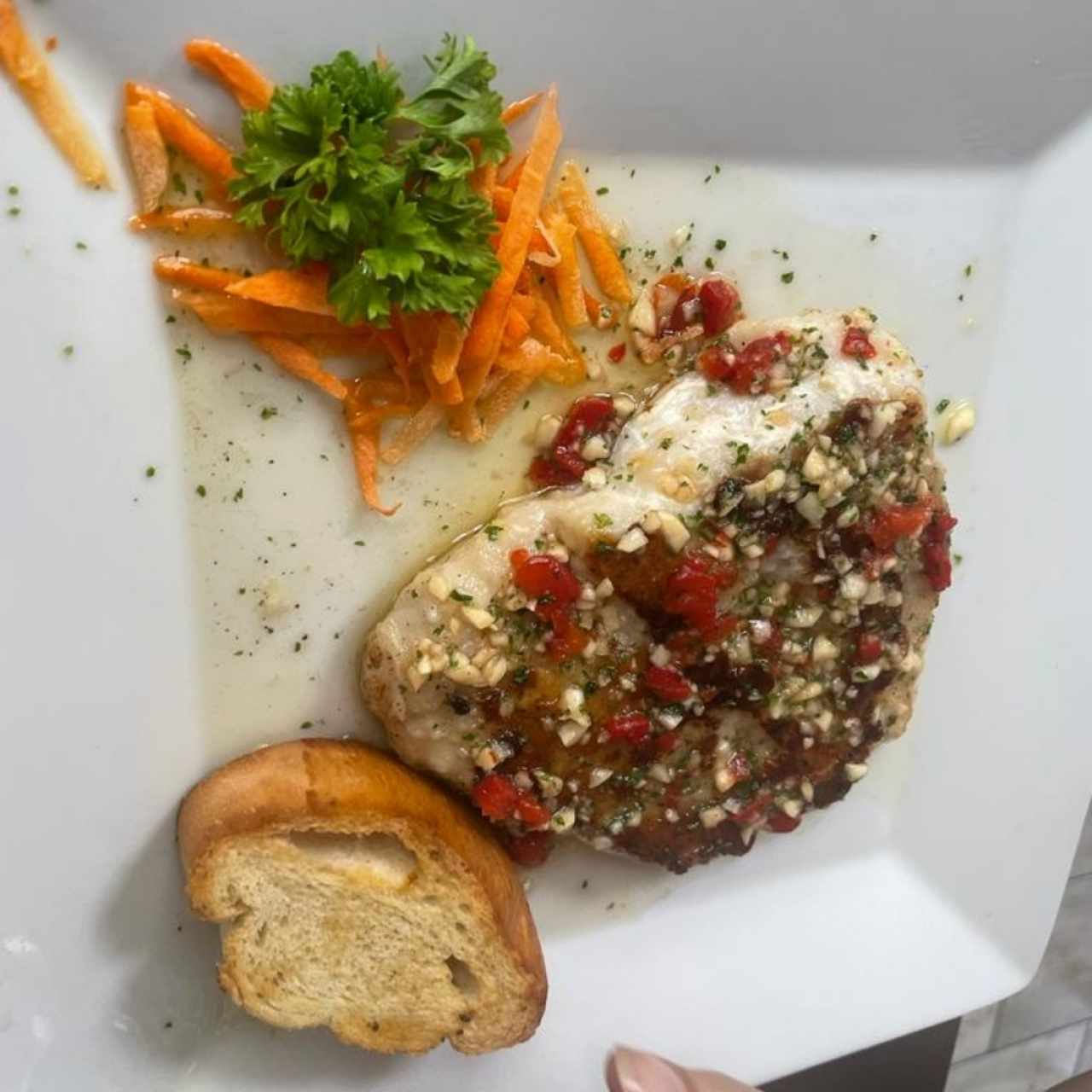Corvina a la Pescatore al Olió