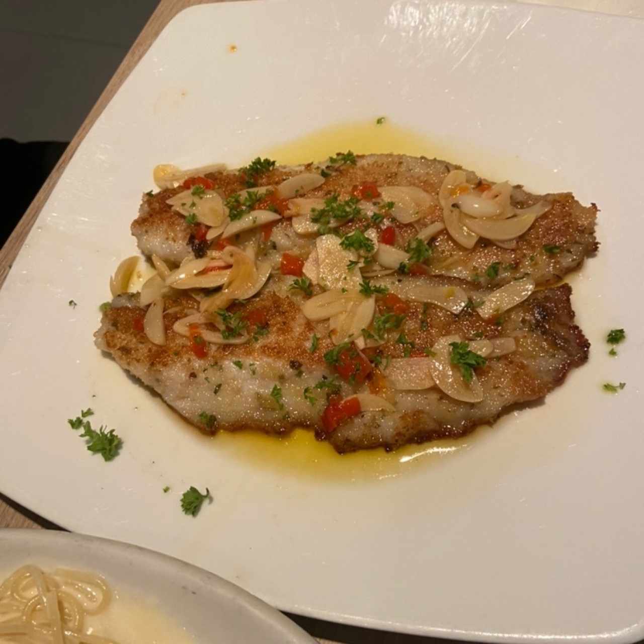 Mariscos - Corvina al Ajillo