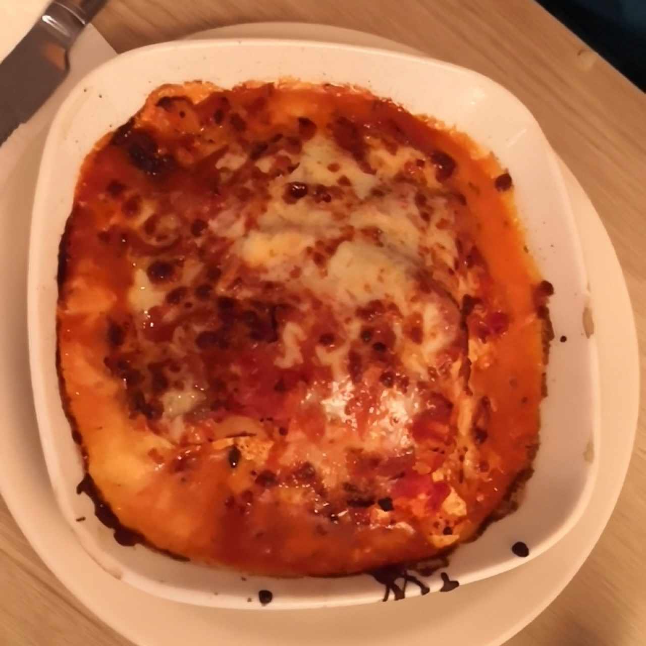 Lasaña gratinada de pollo, salsa pomodoro