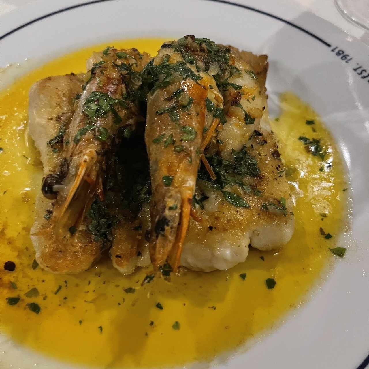 con Langostino y Mantequilla de Cilantro