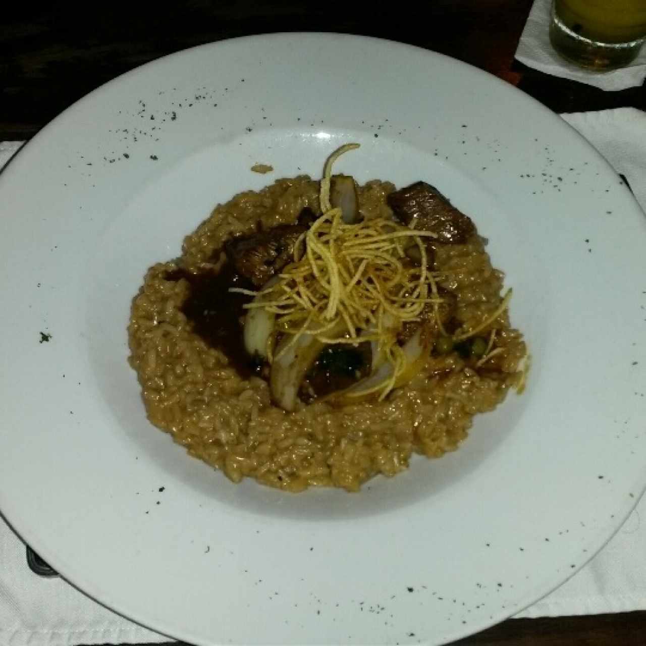 Risotto con lomo saltado