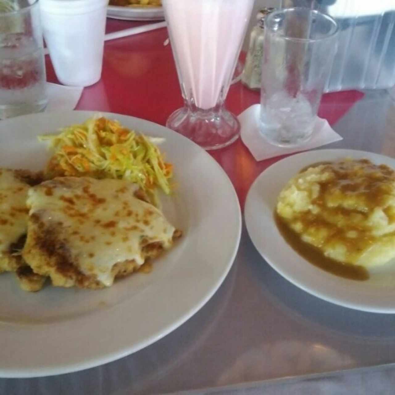 pollo parmesano con puré 