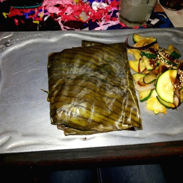 Tilapia en hoja de platano
