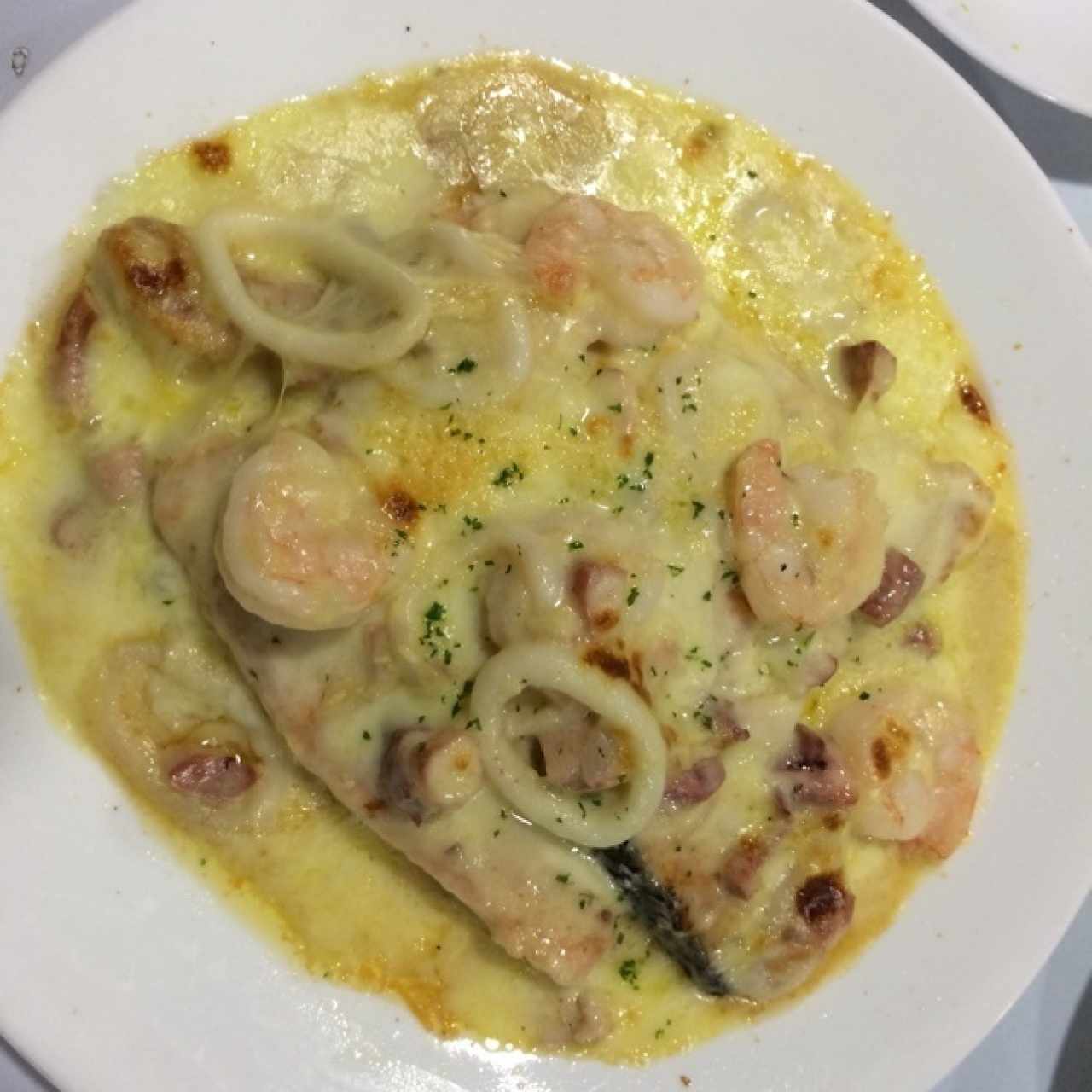 Salmon a la marinera gratinado