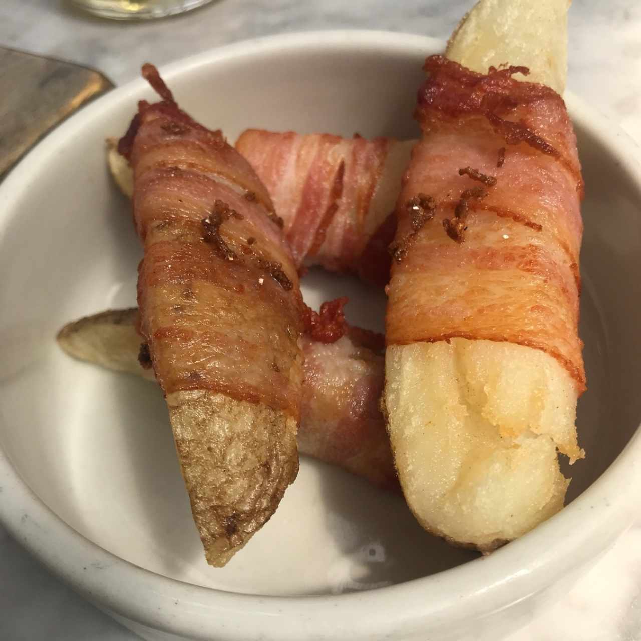 Papas con tocineta