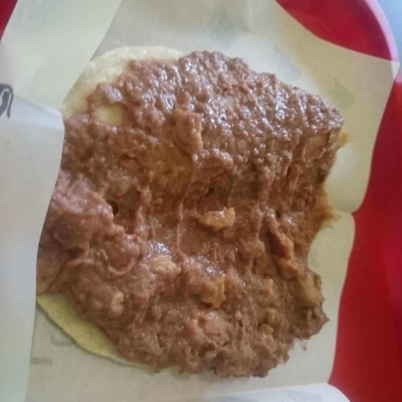 Taco de frijol refrito