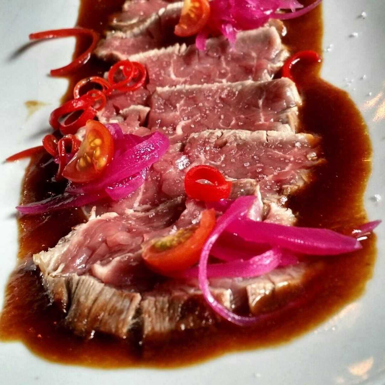 Tiradito de Lomo Saltado en salsa Nikkei