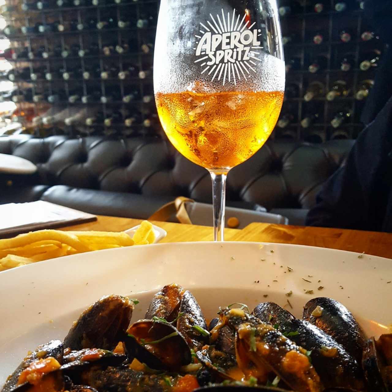 Mejillones a la provenzal y aperol spritz