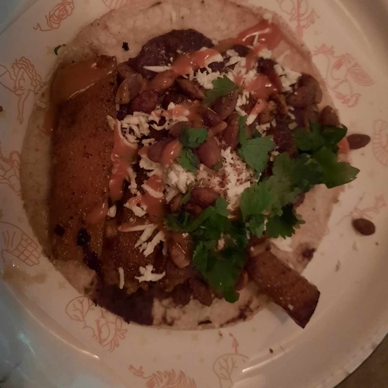Taco de zapallo, fríjol y pepitas