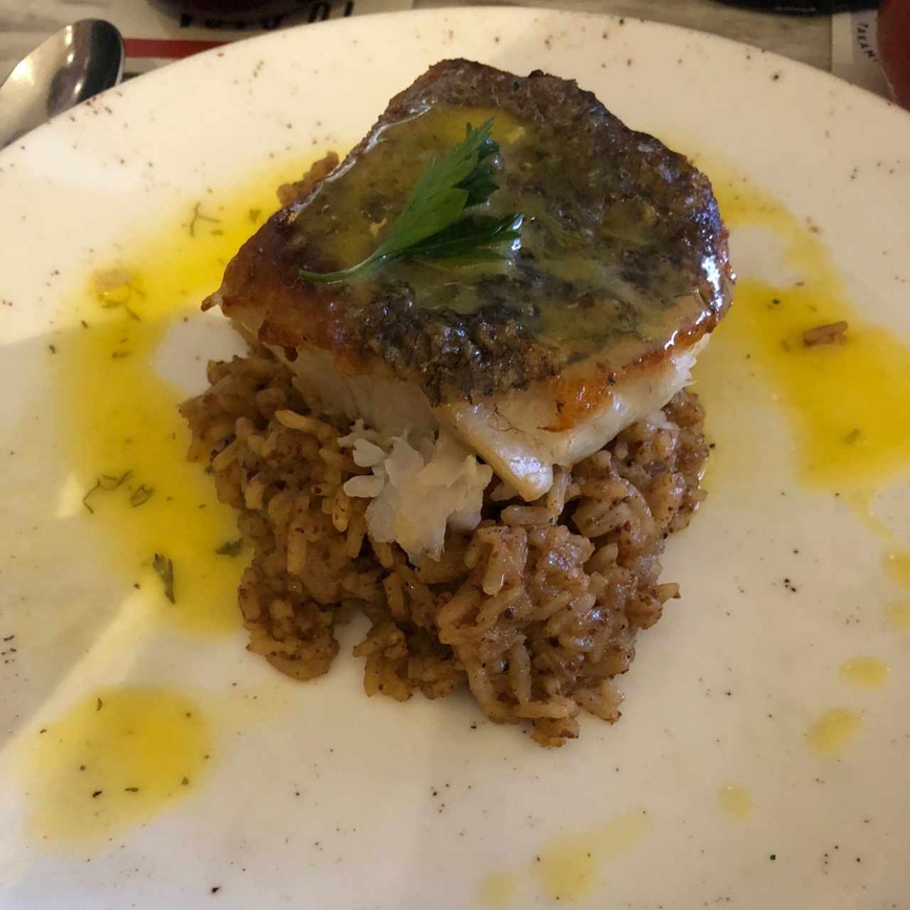 Filete de corvina con arroz de titoté