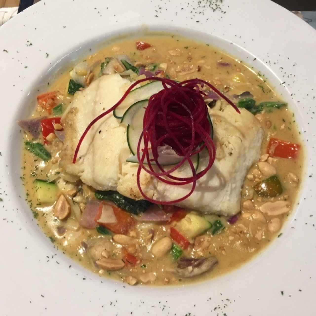 Corvina en salsa de curry