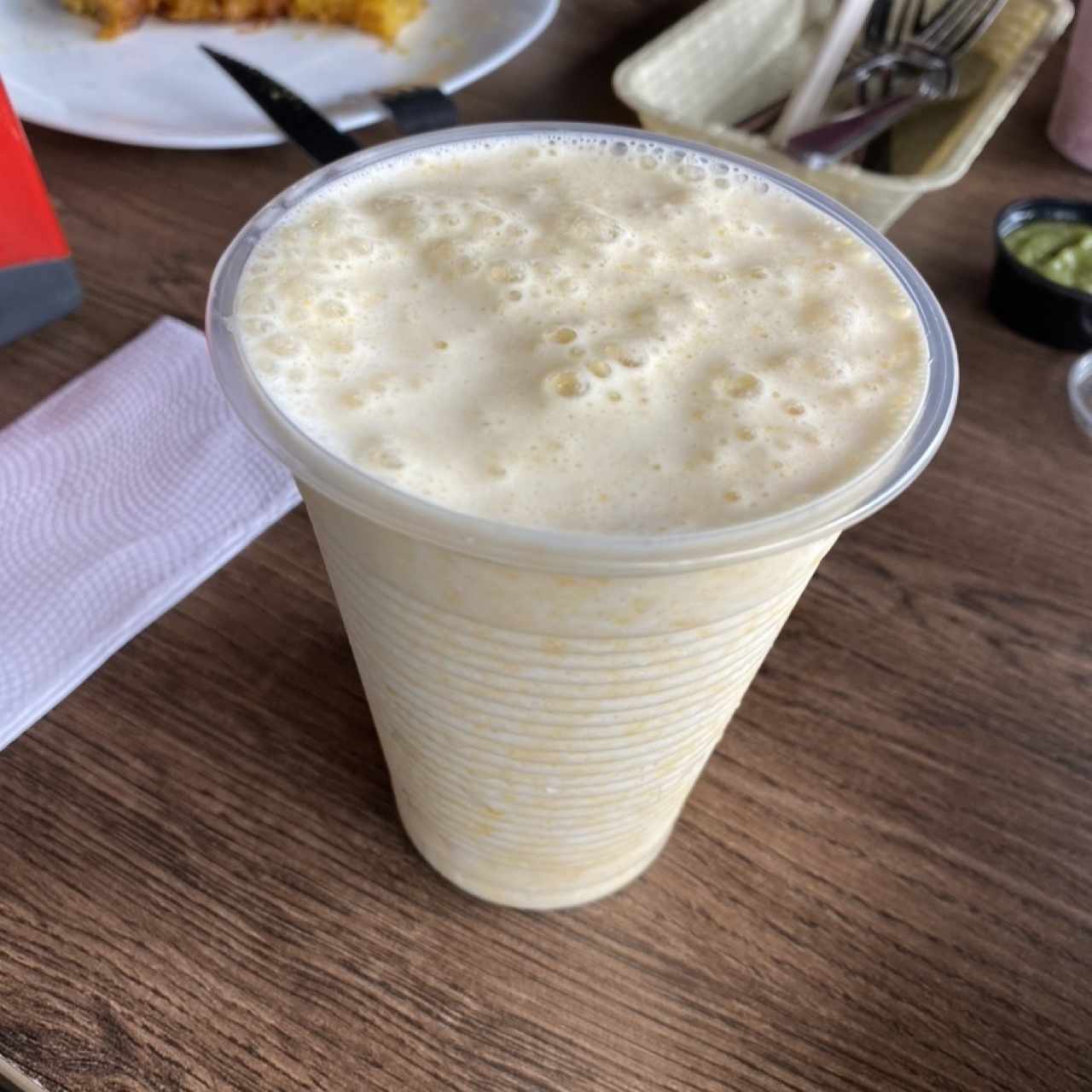 Jugo de mango en leche