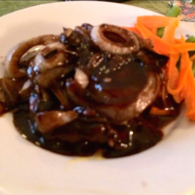 Steak encebollado