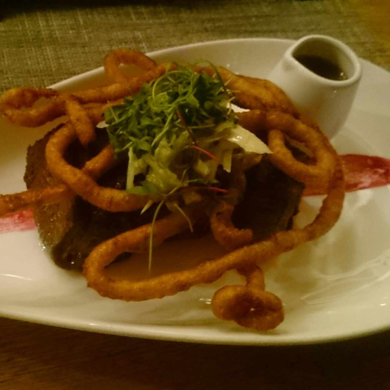 morillo confitado con churros de queso 