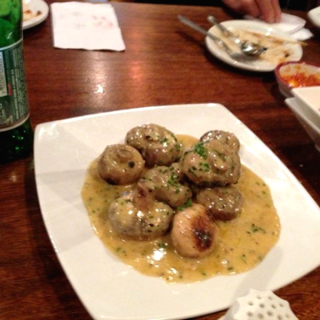 Champiñones al ajillo