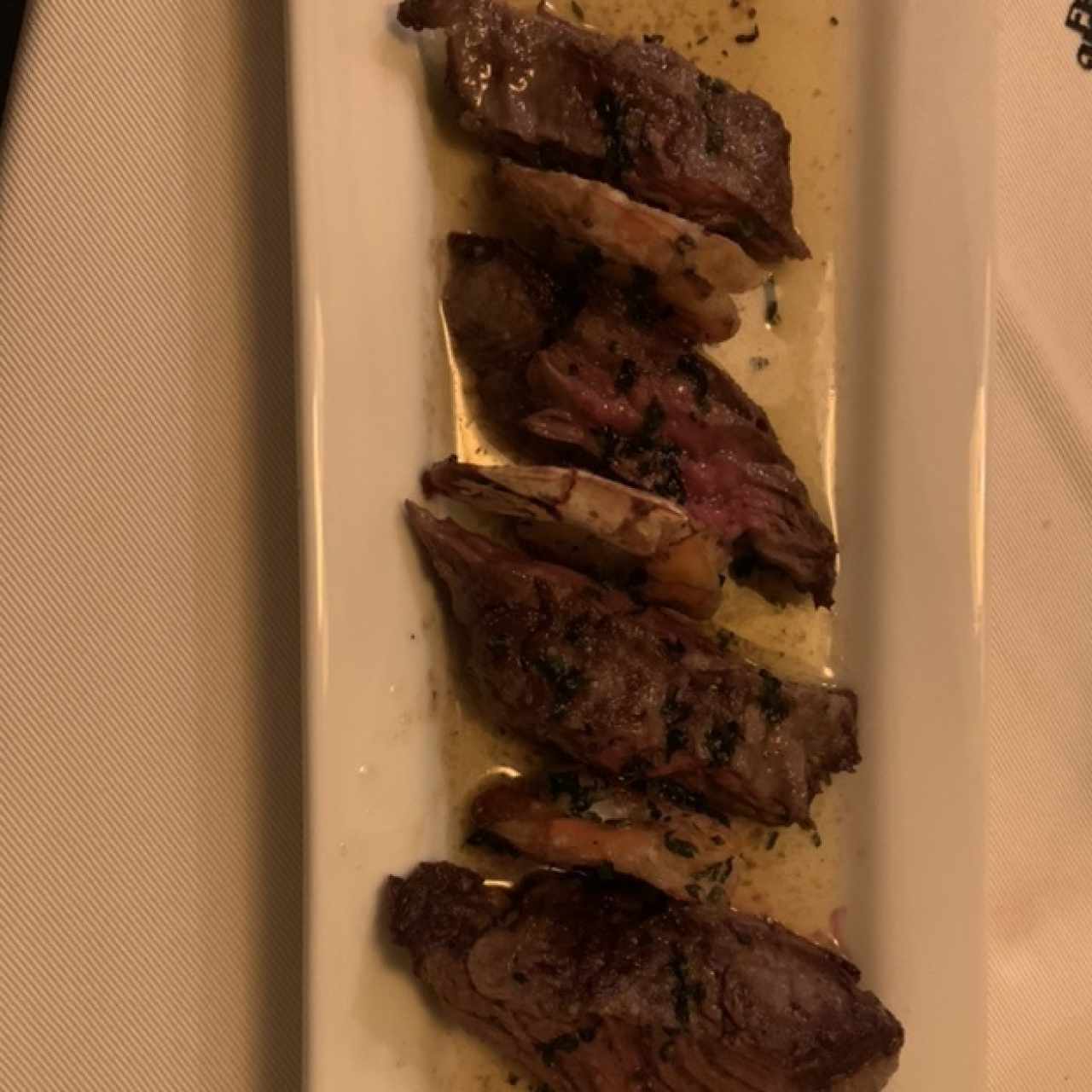 Res y Langostinos al ajillo 