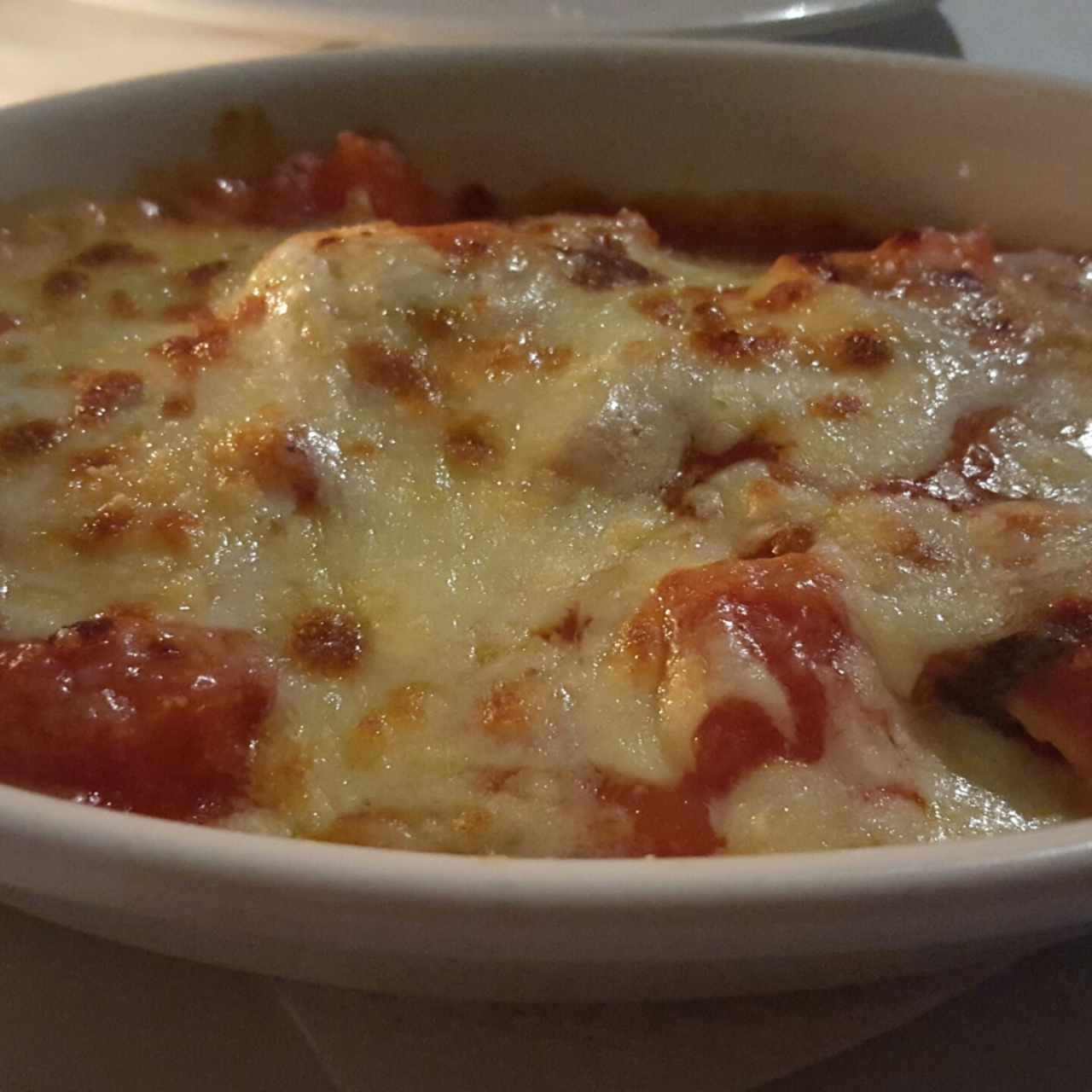 ravioles gratinados