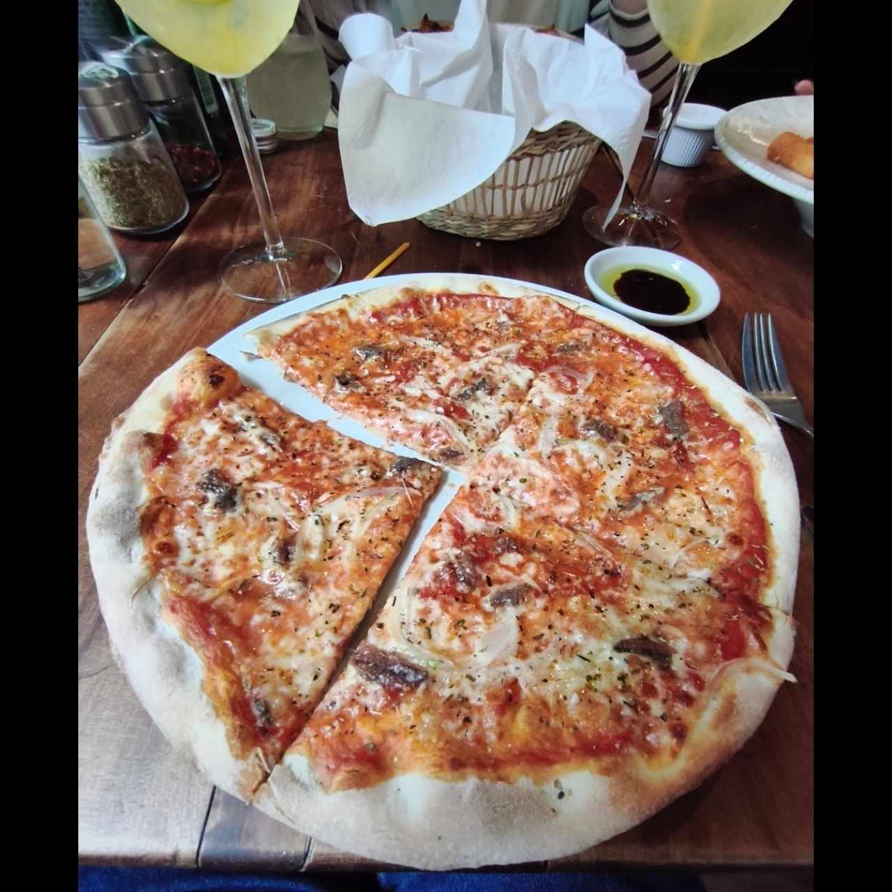 Pizza personal de anchoas.
